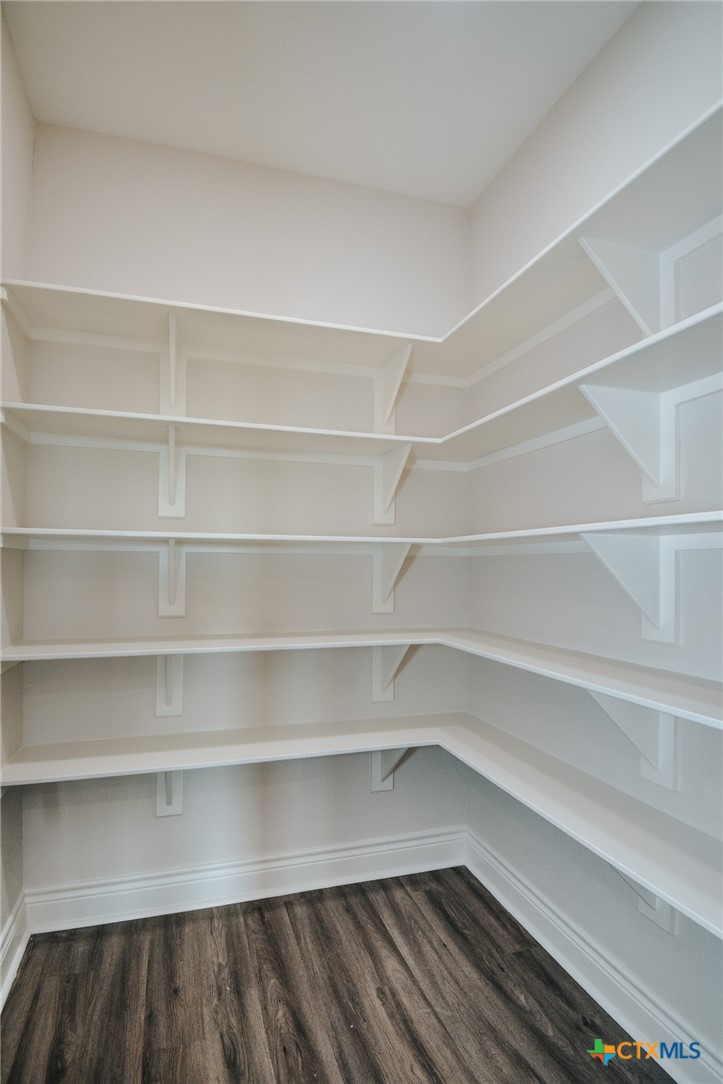 321 Whitetail Lane Victoria, TX 77905 - Photo 21 of 47 a view of walk in closet with empty racks