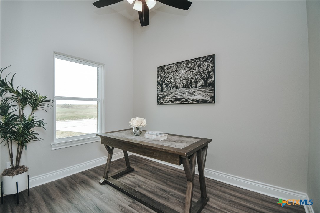 321 Whitetail Lane Victoria, TX 77905 - Photo 22 of 47 a view of a workspace with furniture and a window
