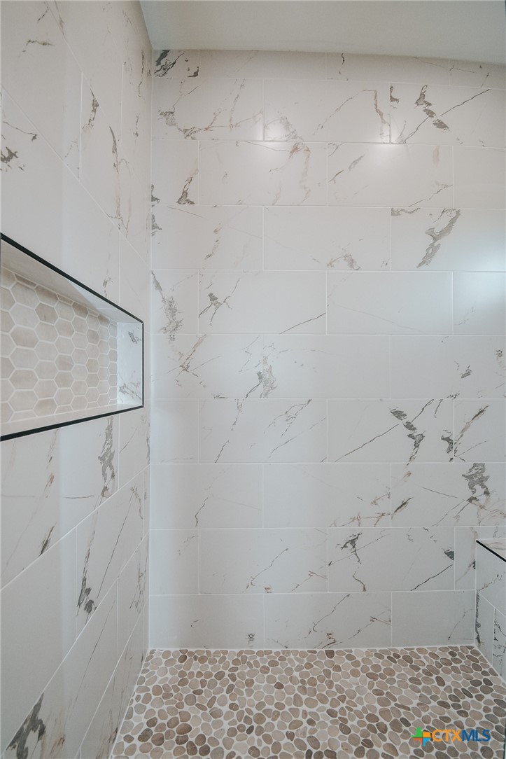 321 Whitetail Lane Victoria, TX 77905 - Photo 40 of 47 a bathroom with a shower