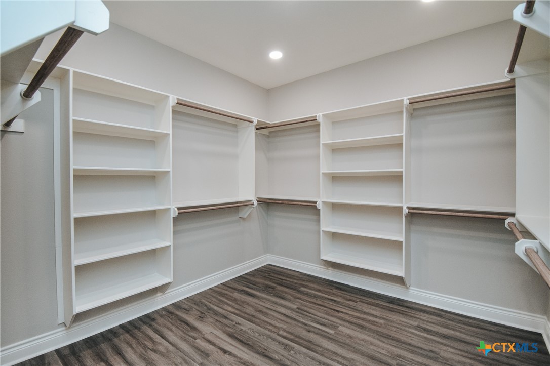 321 Whitetail Lane Victoria, TX 77905 - Photo 42 of 47 a view of walk in closet with empty racks