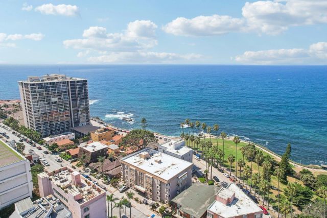 a view of a lake with a city view