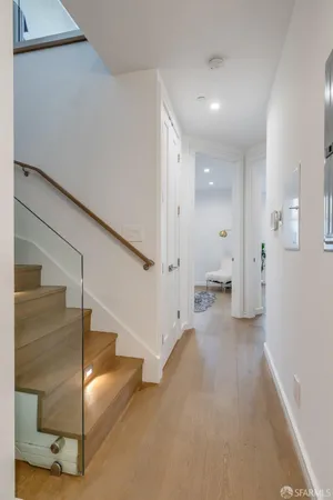a view of a hallway with staircase