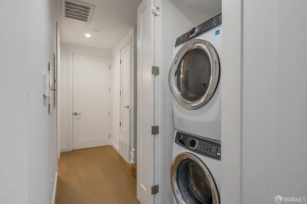a storage room with washer and dryer