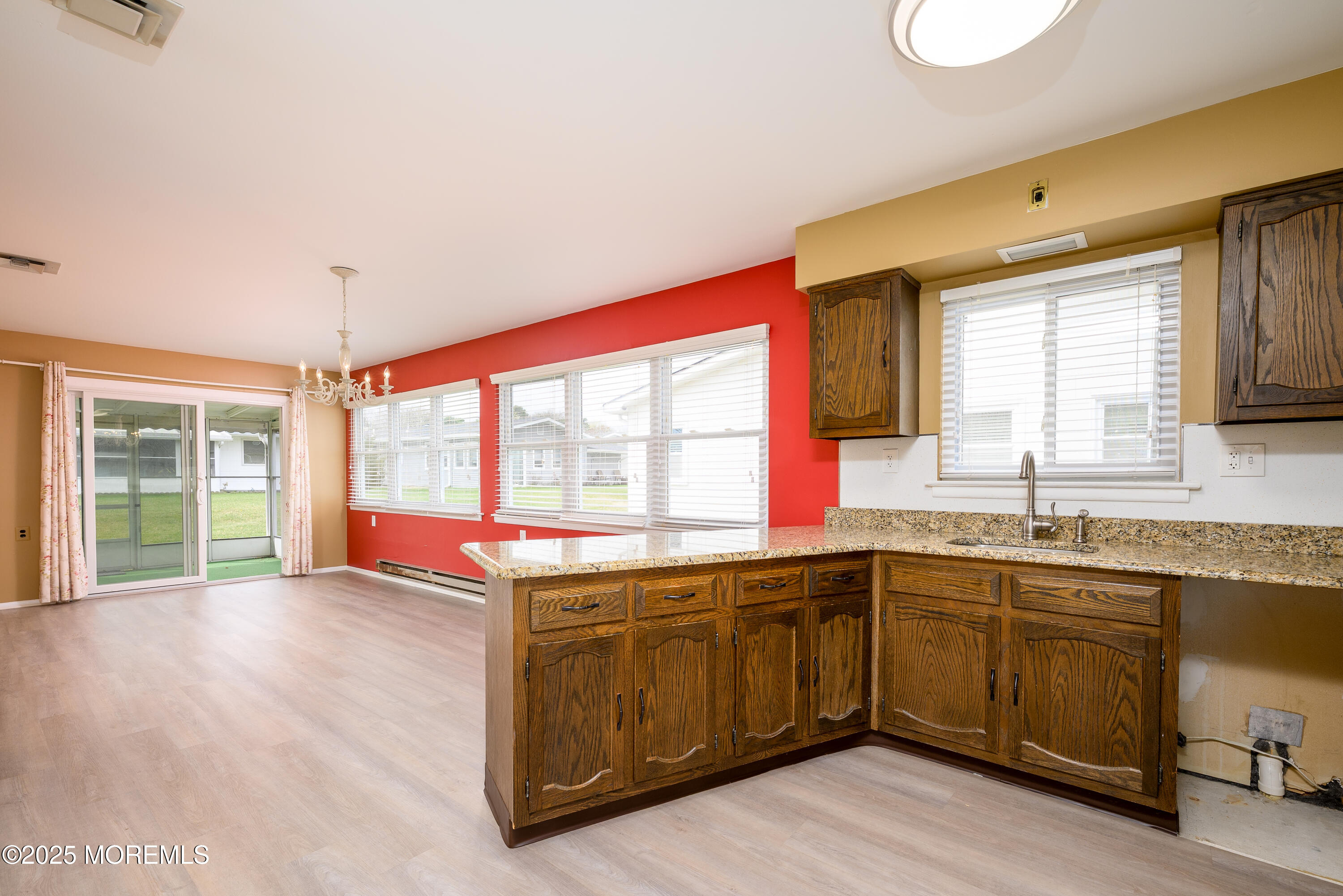 27 Blake Circle Brick, NJ 08724 - Photo 12 of 39 a open kitchen with a sink window and cabinets