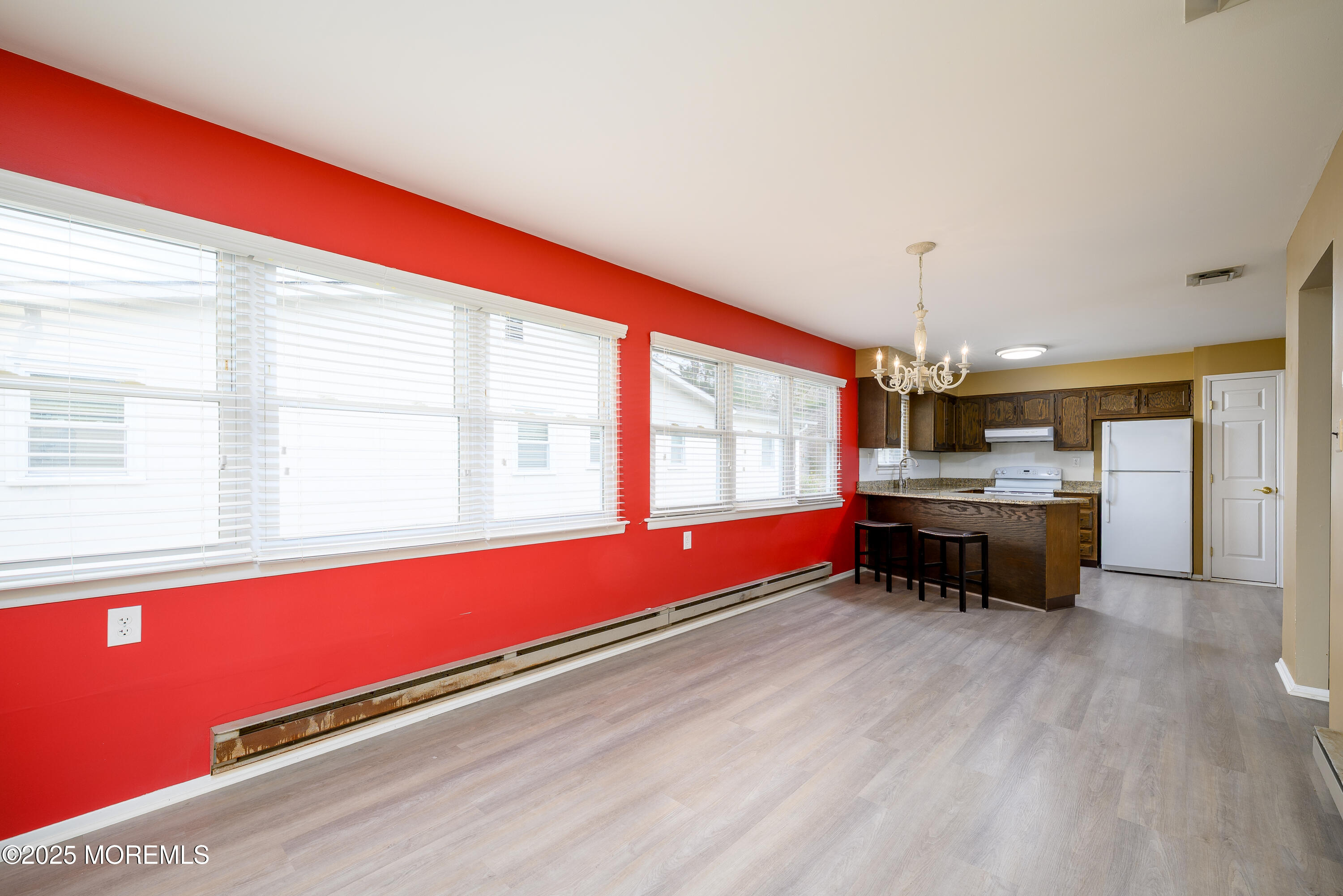 27 Blake Circle Brick, NJ 08724 - Photo 16 of 39 a kitchen with stainless steel appliances kitchen island granite countertop a stove and a wooden cabinets