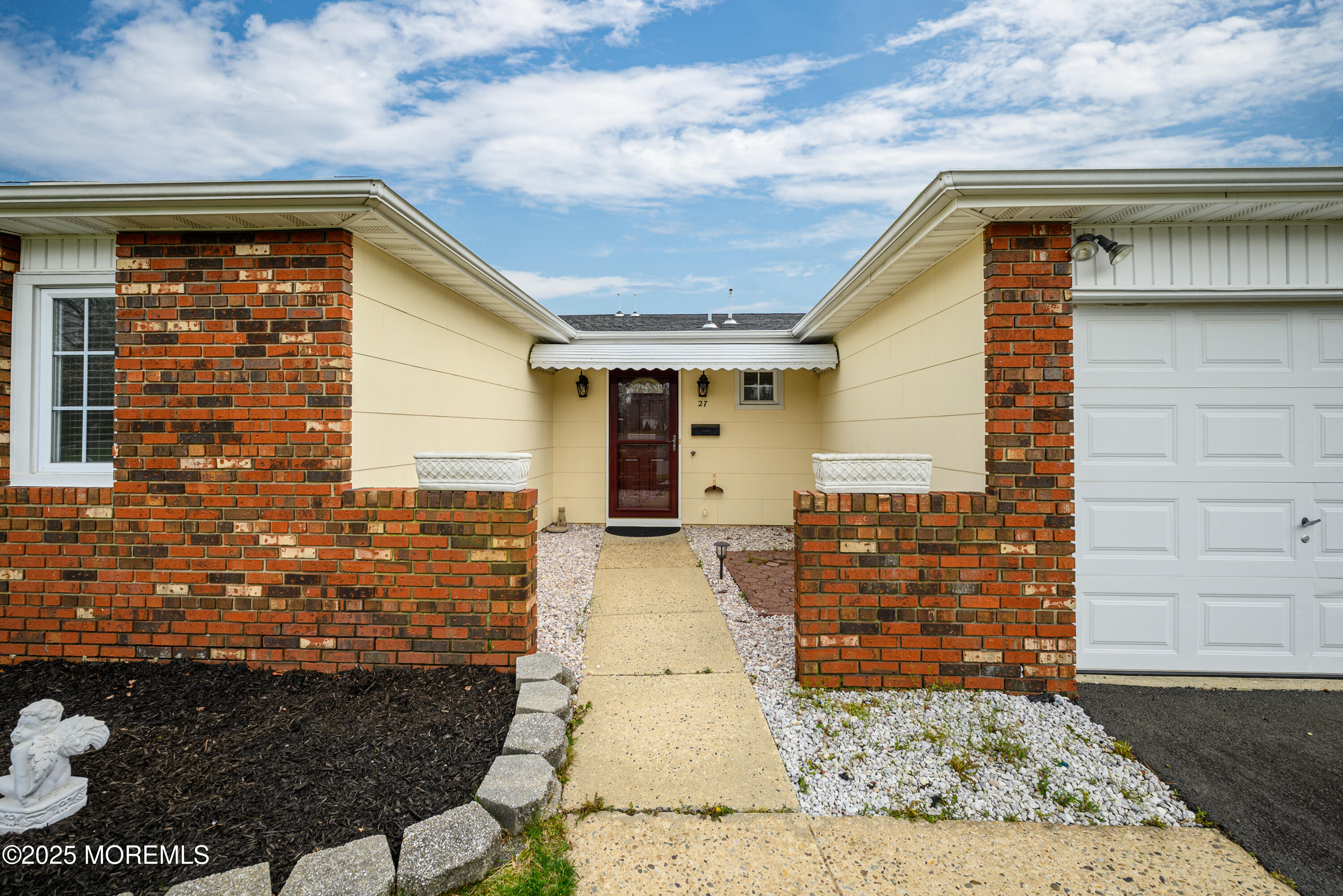 27 Blake Circle Brick, NJ 08724 - Photo 2 of 39 a front view of a house with parking