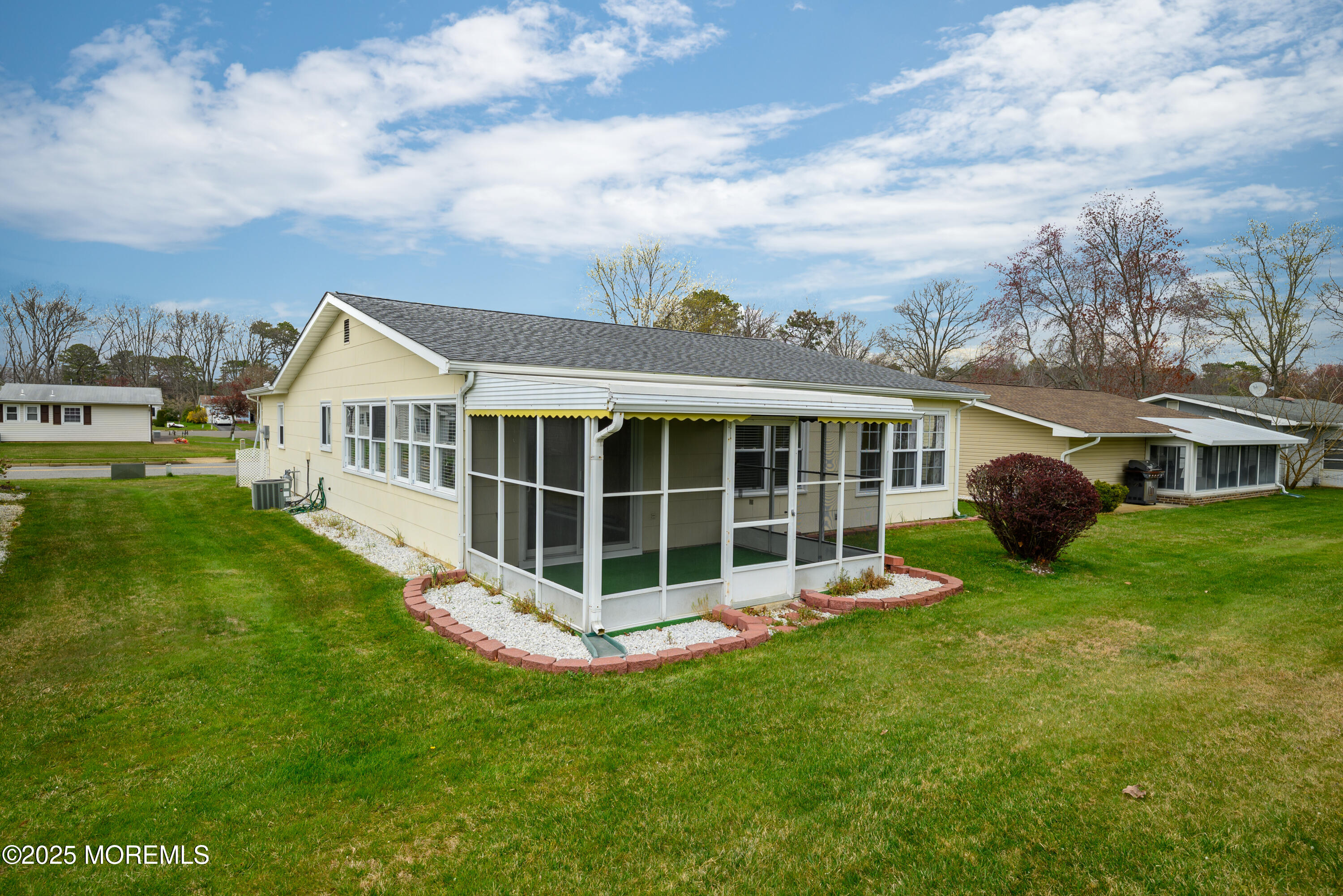 27 Blake Circle Brick, NJ 08724 - Photo 30 of 39 a view of a house with a big yard and large trees