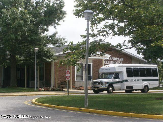 27 Blake Circle Brick, NJ 08724 - Photo 32 of 39 a front view of a house with garden