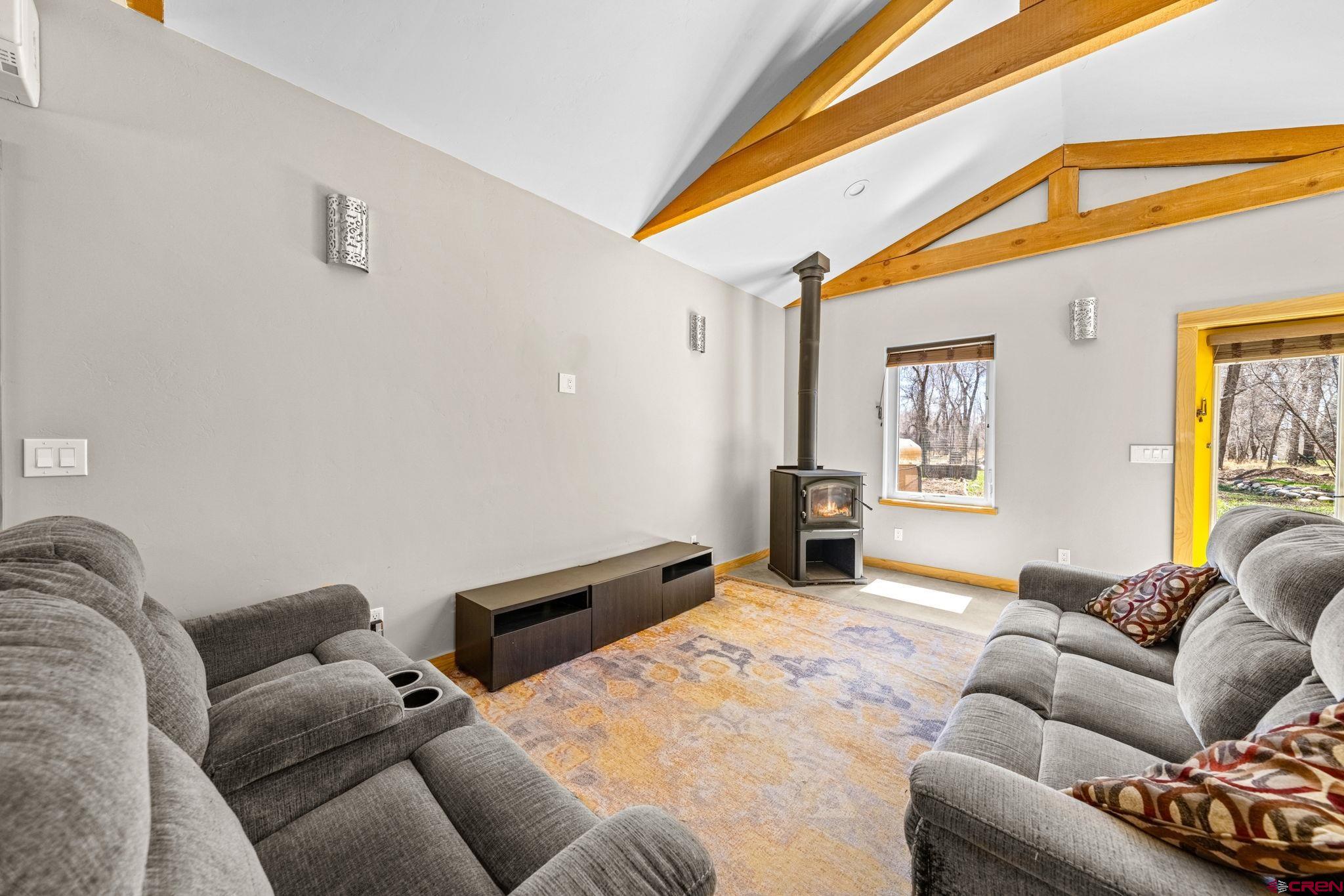 124 Richards Drive Bayfield, CO 81122 - Photo 13 of 42 a bedroom with furniture and a window