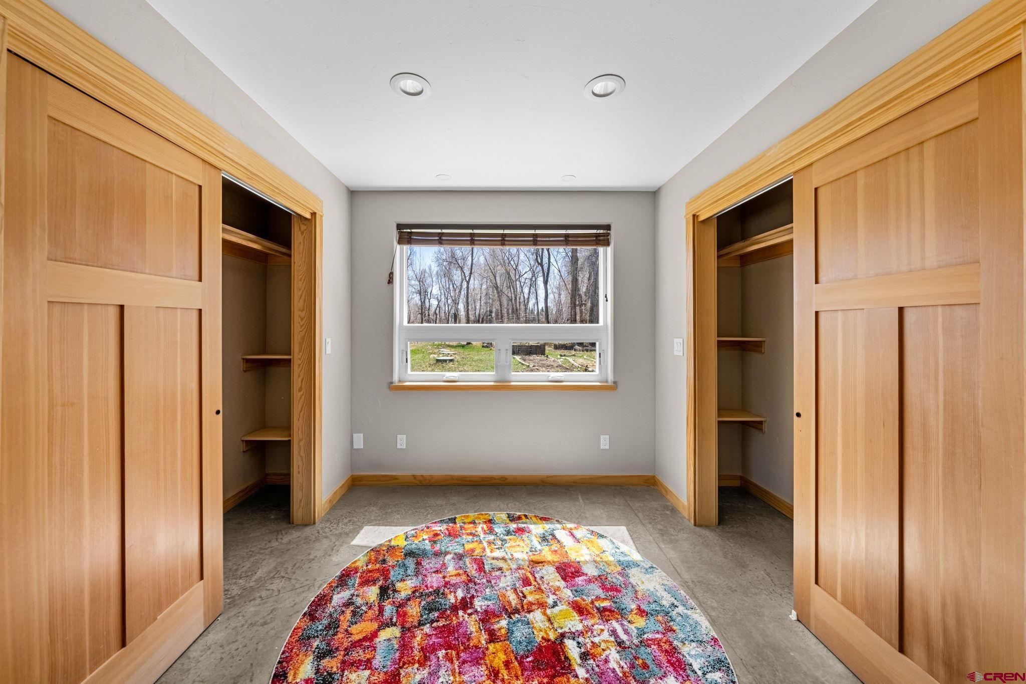 124 Richards Drive Bayfield, CO 81122 - Photo 19 of 42 a view of bedroom with furniture and window
