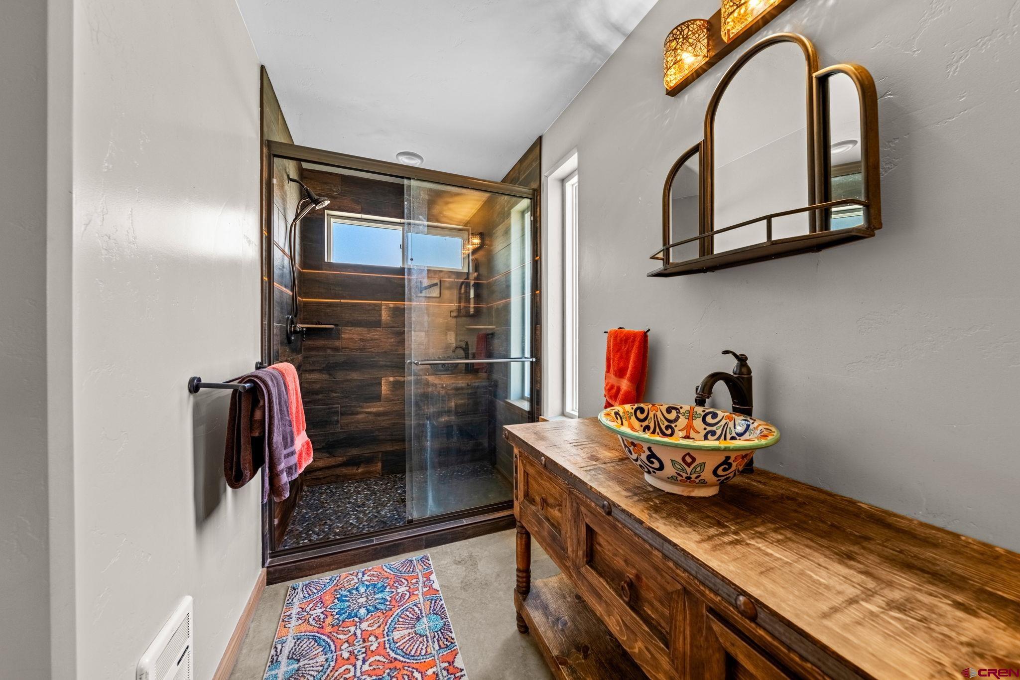 124 Richards Drive Bayfield, CO 81122 - Photo 20 of 42 a room with a table and chairs