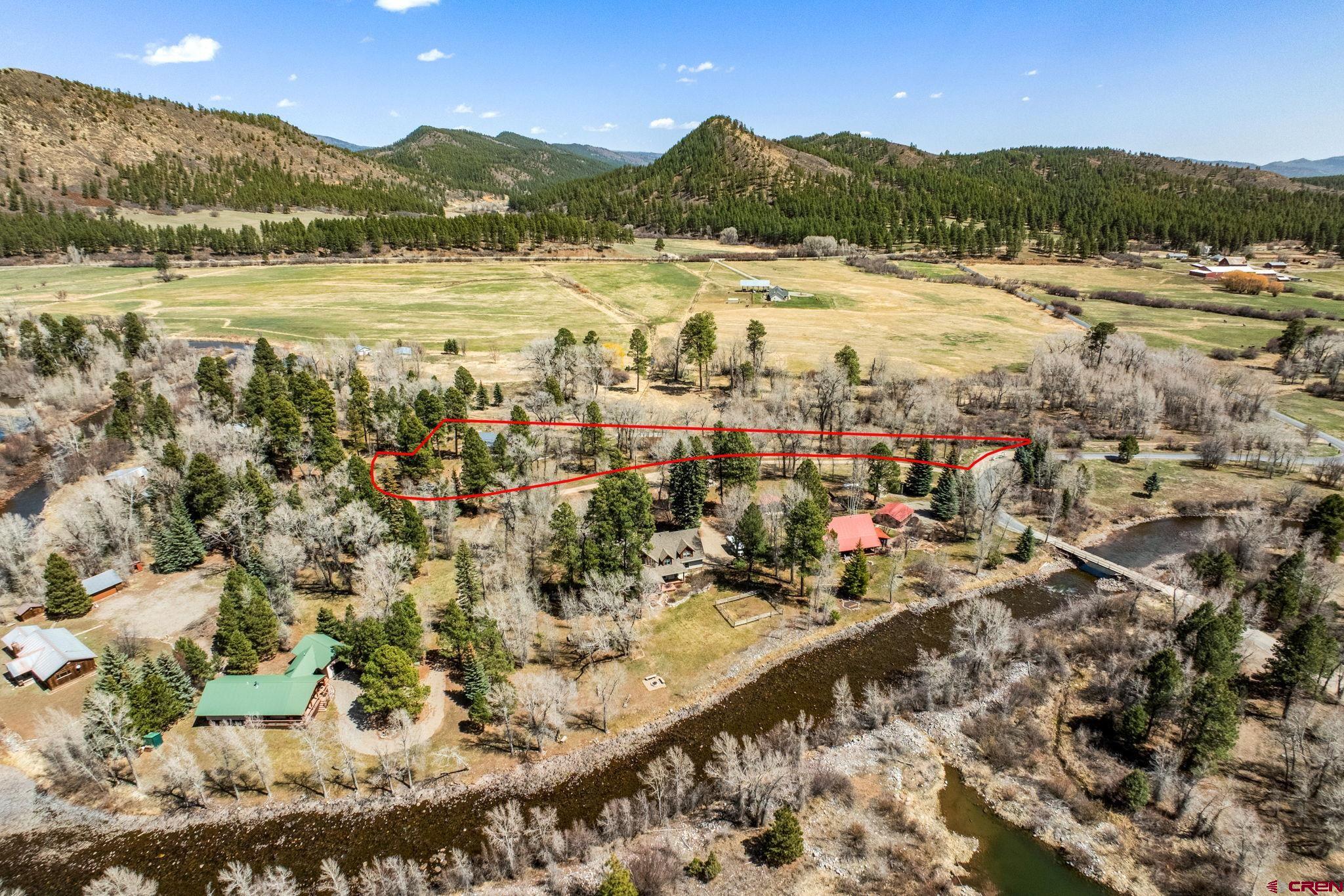 124 Richards Drive Bayfield, CO 81122 - Photo 2 of 42 a view of lake and mountain