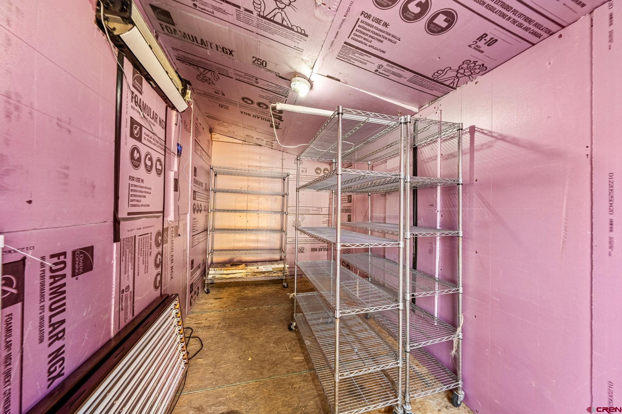 124 Richards Drive Bayfield, CO 81122 - Photo 31 of 42 a view of an empty room with wooden walls