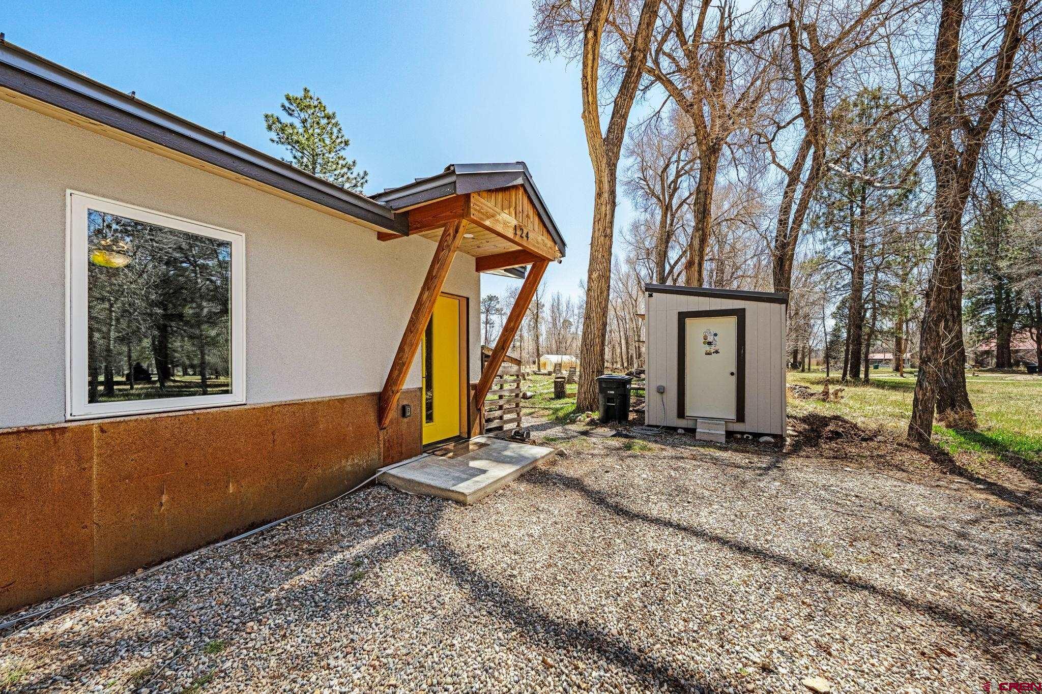 124 Richards Drive Bayfield, CO 81122 - Photo 32 of 42 a backyard of a house with seating space