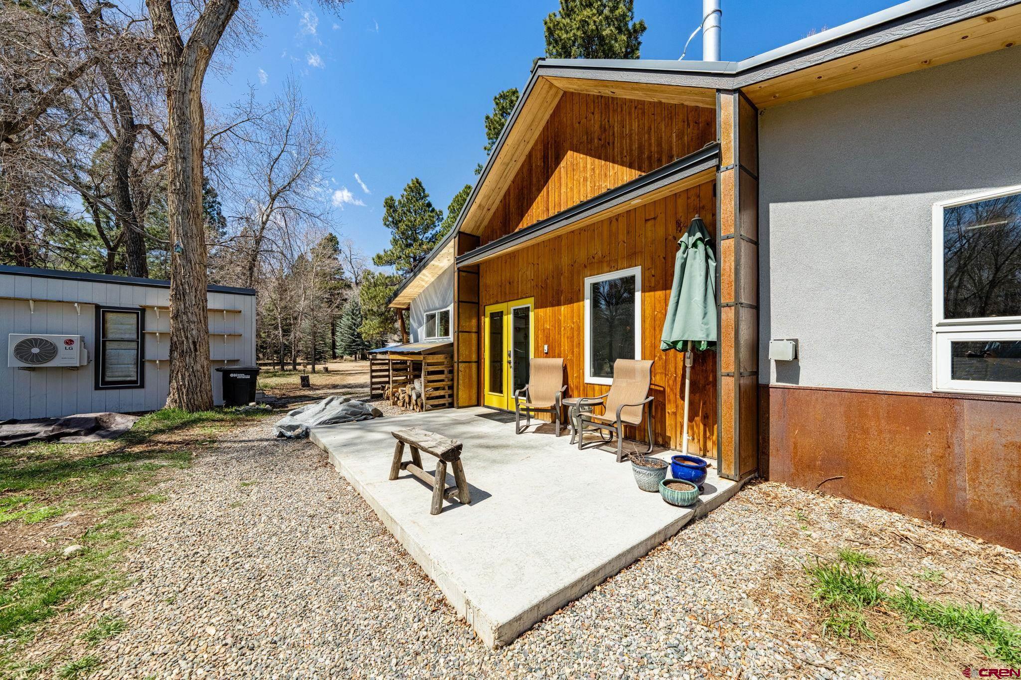 124 Richards Drive Bayfield, CO 81122 - Photo 33 of 42 a view of a house with pool and sitting area