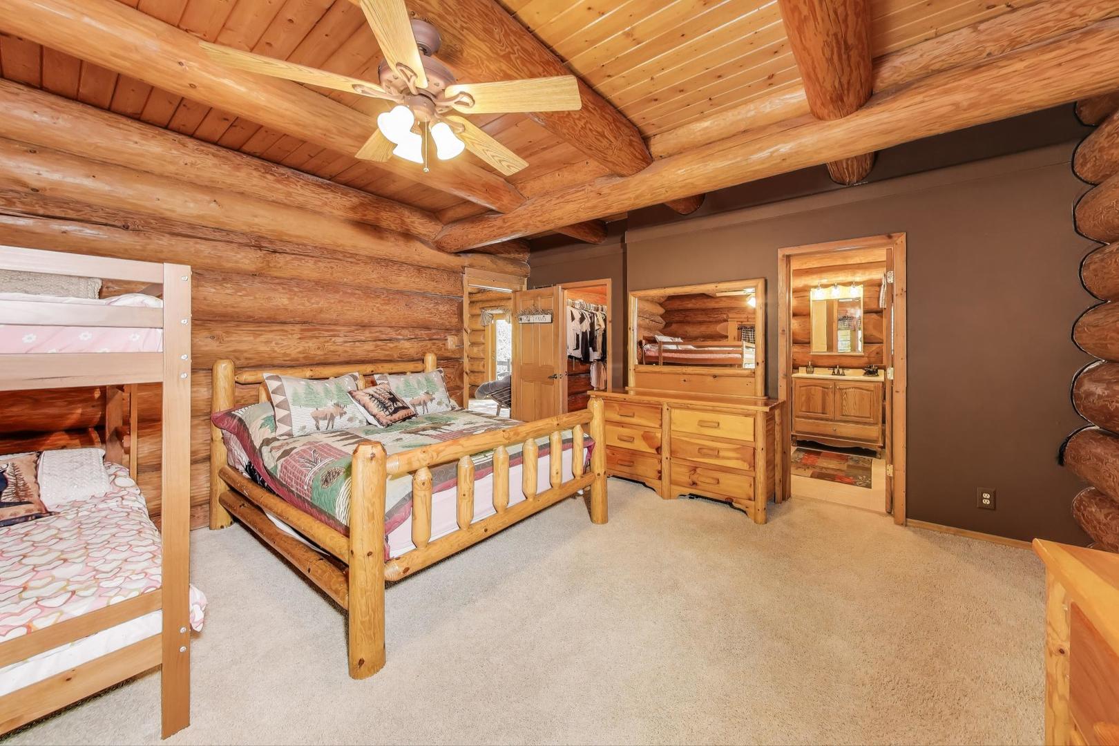 19542 Bauer Road Custer Park, IL 60481 - Photo 12 of 42 a bedroom with furniture and a chandelier
