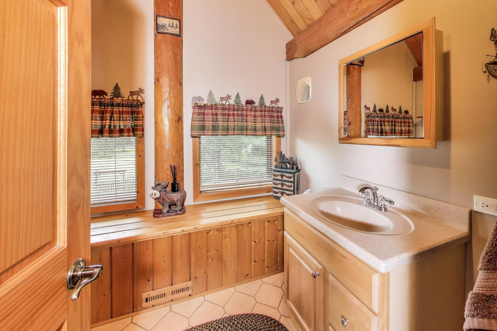 19542 Bauer Road Custer Park, IL 60481 - Photo 19 of 42 a bathroom with a sink and a bathtub