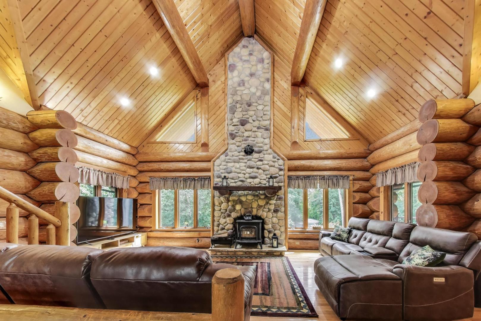 19542 Bauer Road Custer Park, IL 60481 - Photo 4 of 42 a living room with furniture a fireplace and a ceiling fan