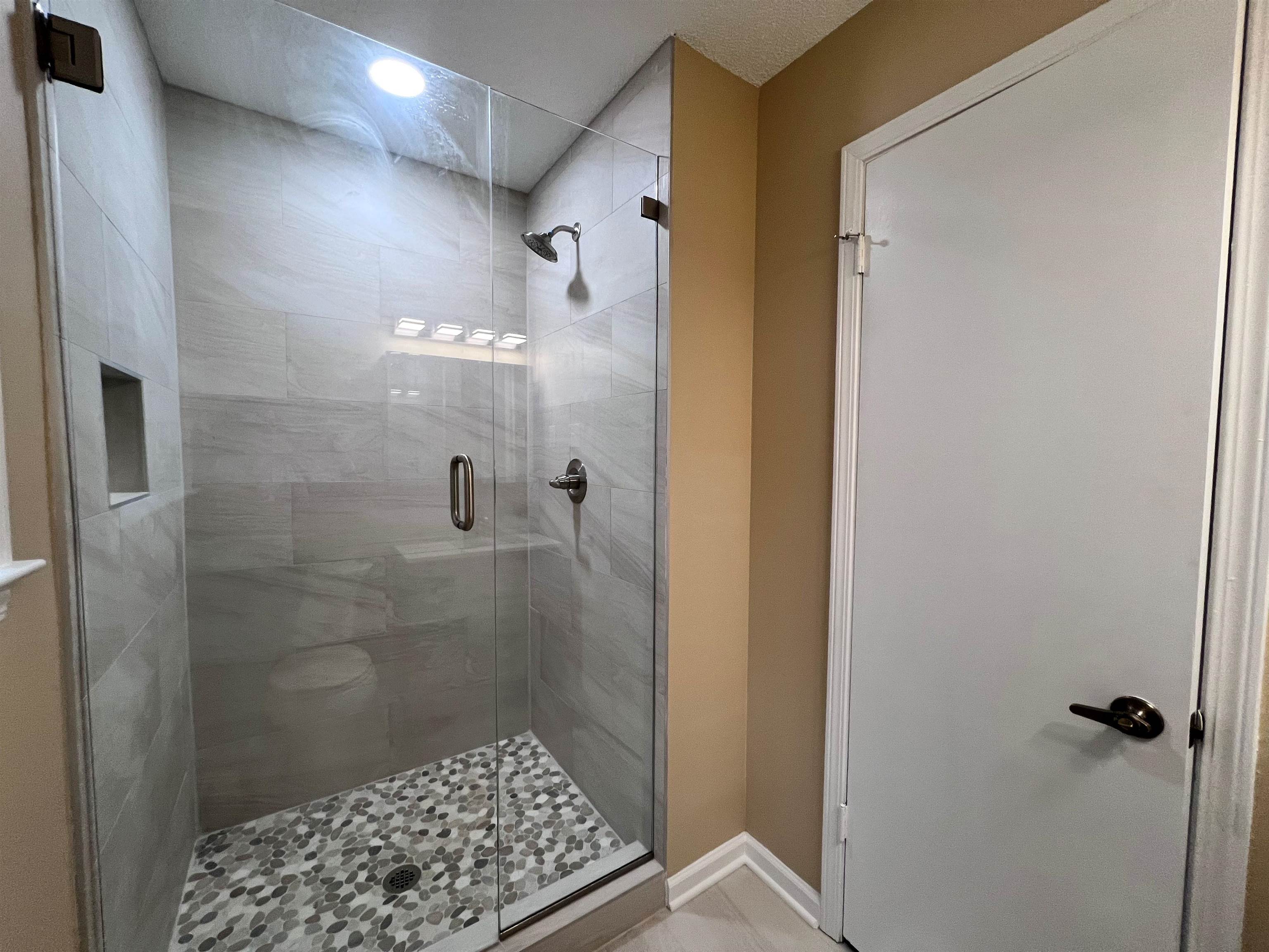 309 West Powell Road Collierville, TN 38017 - Photo 19 of 40 a bathroom with a shower