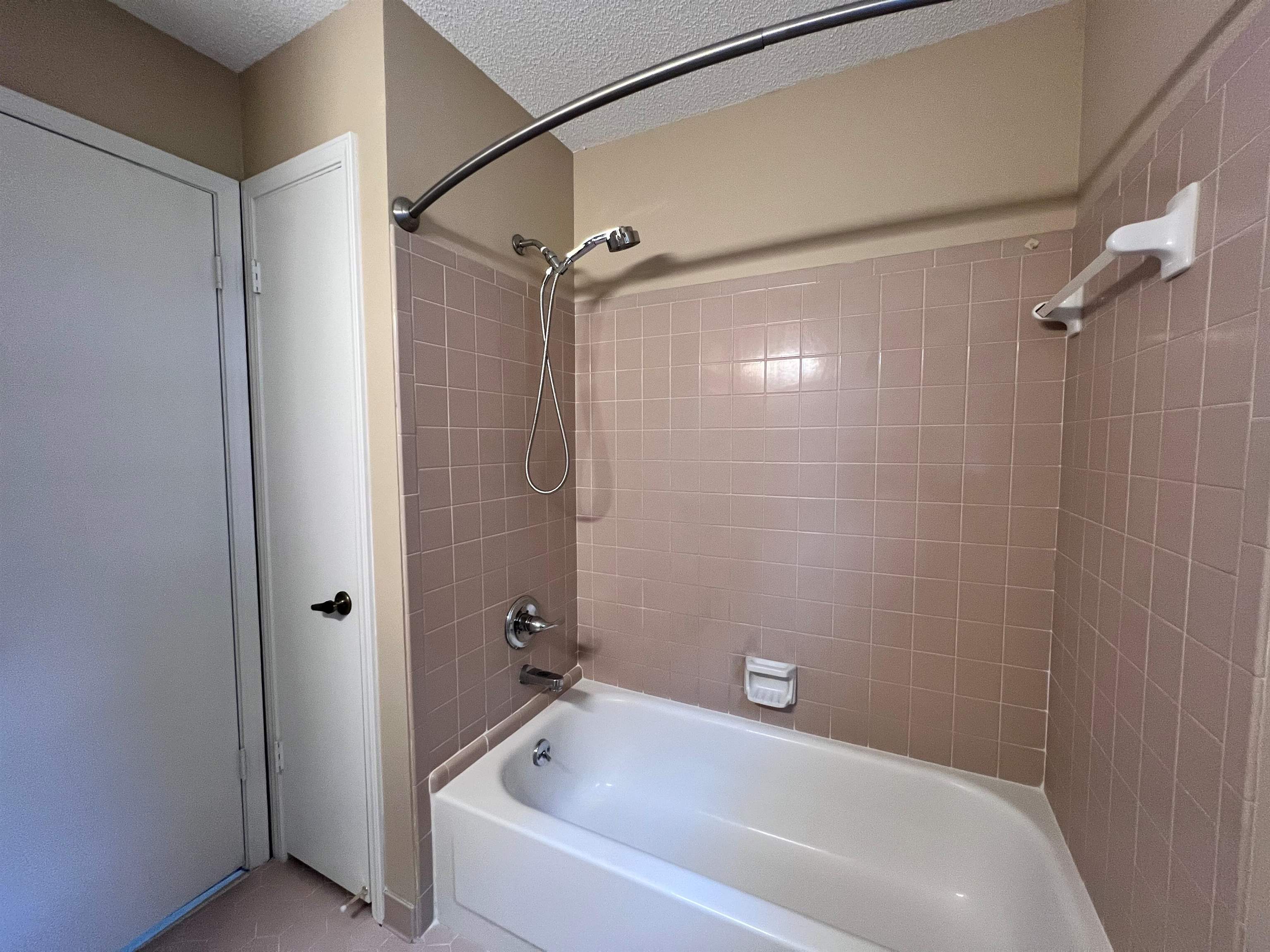 309 West Powell Road Collierville, TN 38017 - Photo 23 of 40 a bathroom with a white bath tub