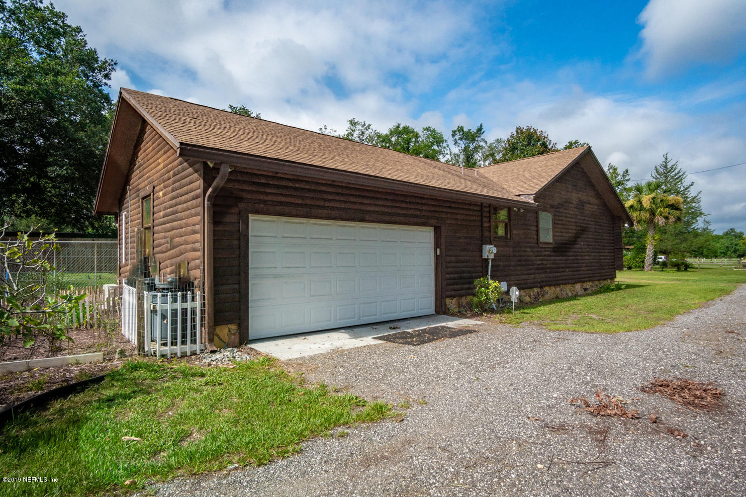 2253 Oxbow Road Jacksonville, FL 32210 - Photo 35 of 50 Exterior Garage Side