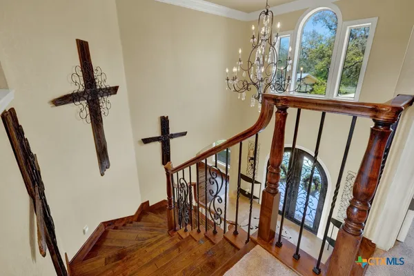 a spacious bedroom with a bed and a window