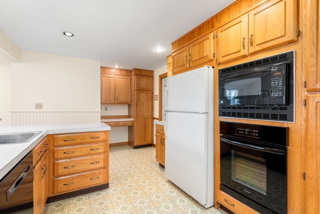 3 Tower Road Lexington, MA 02421 - Photo 15 of 38 a kitchen with appliances and cabinets
