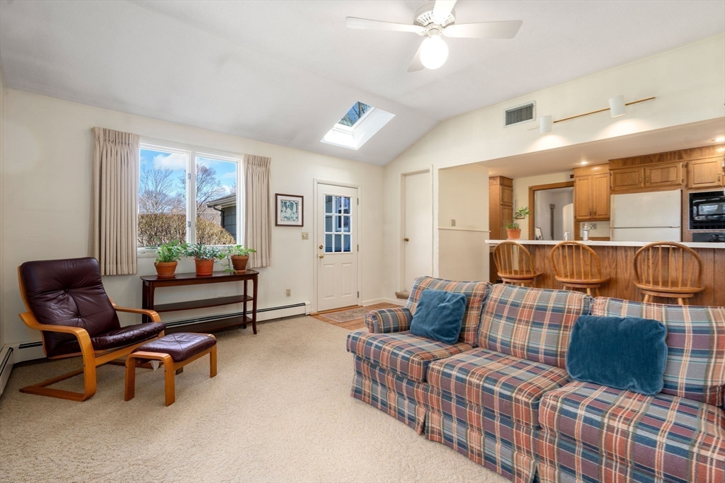 3 Tower Road Lexington, MA 02421 - Photo 18 of 38 a living room with furniture and a window