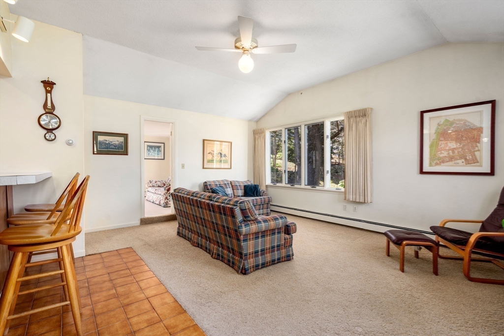 3 Tower Road Lexington, MA 02421 - Photo 20 of 38 a living room with furniture and a window
