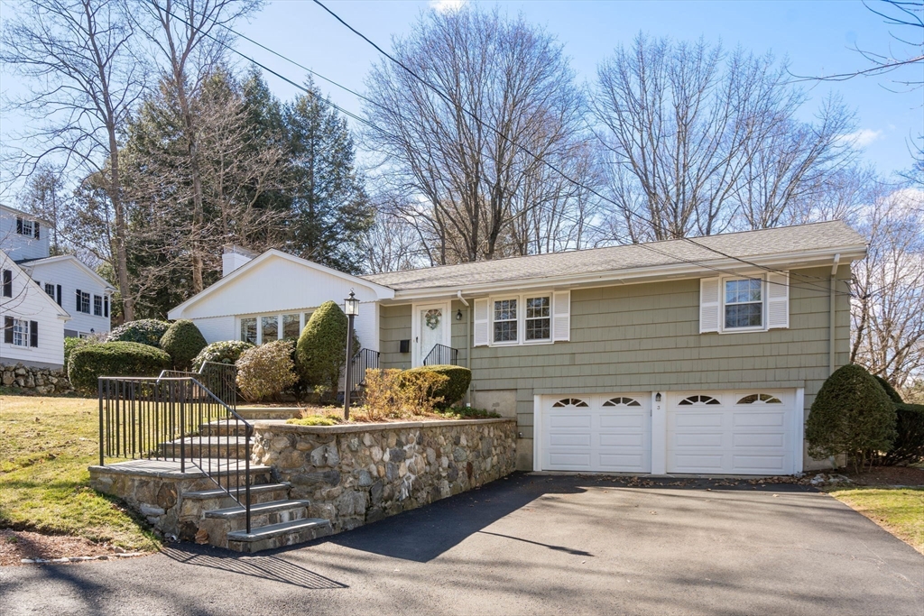 3 Tower Road Lexington, MA 02421 - Photo 2 of 38 a front view of a house with a garden