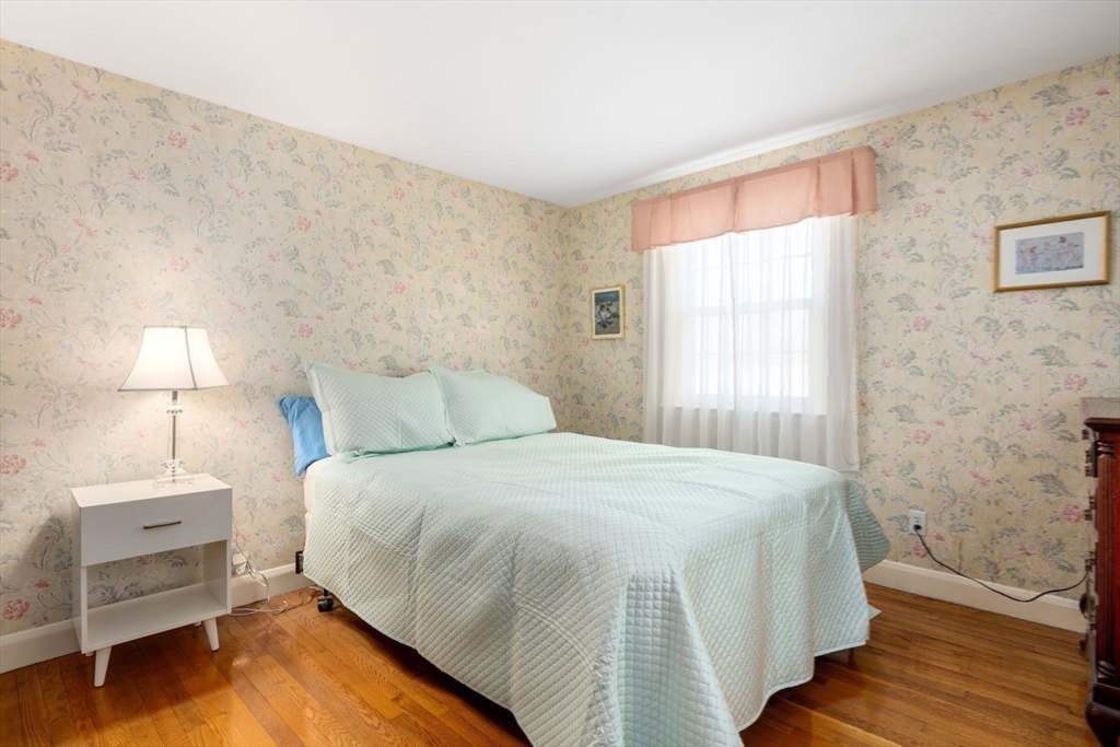 3 Tower Road Lexington, MA 02421 - Photo 26 of 38 a bedroom with a bed and a window