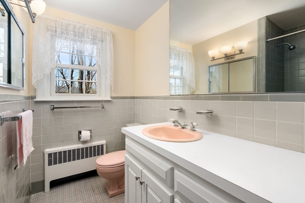 3 Tower Road Lexington, MA 02421 - Photo 28 of 38 a bathroom with a sink and a toilet