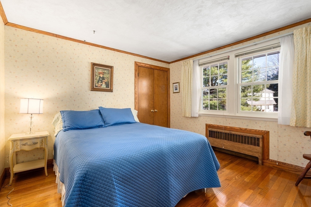 3 Tower Road Lexington, MA 02421 - Photo 29 of 38 a bedroom with a bed and a window