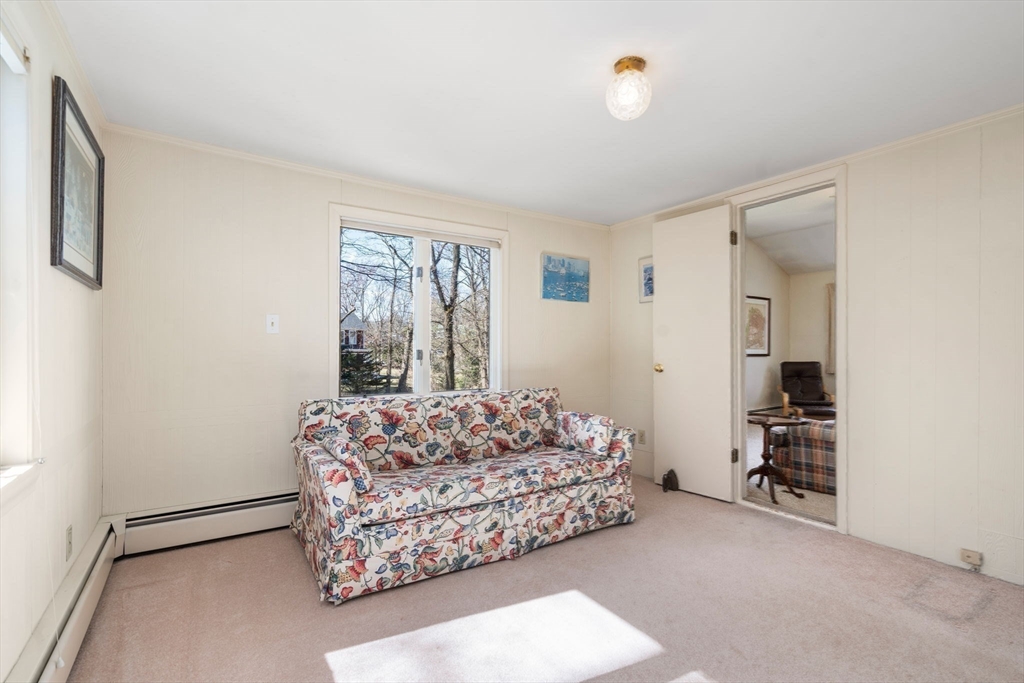 3 Tower Road Lexington, MA 02421 - Photo 30 of 38 a living room with furniture and a window