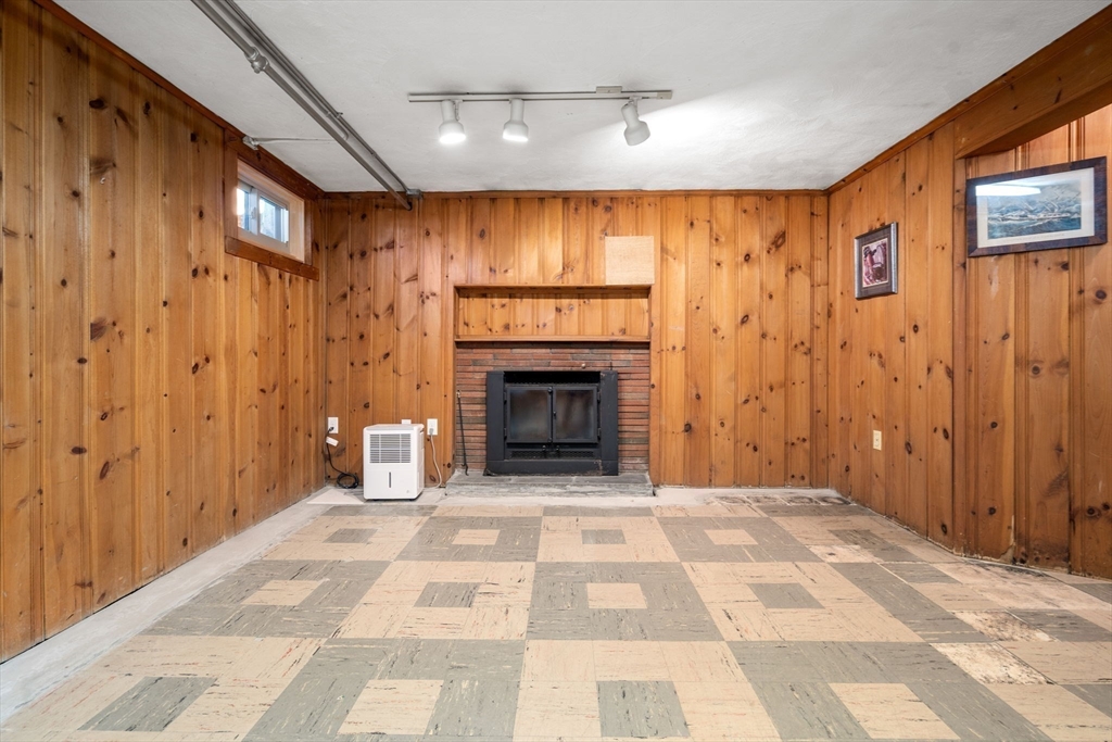 3 Tower Road Lexington, MA 02421 - Photo 32 of 38 a view of a livingroom with a fireplace