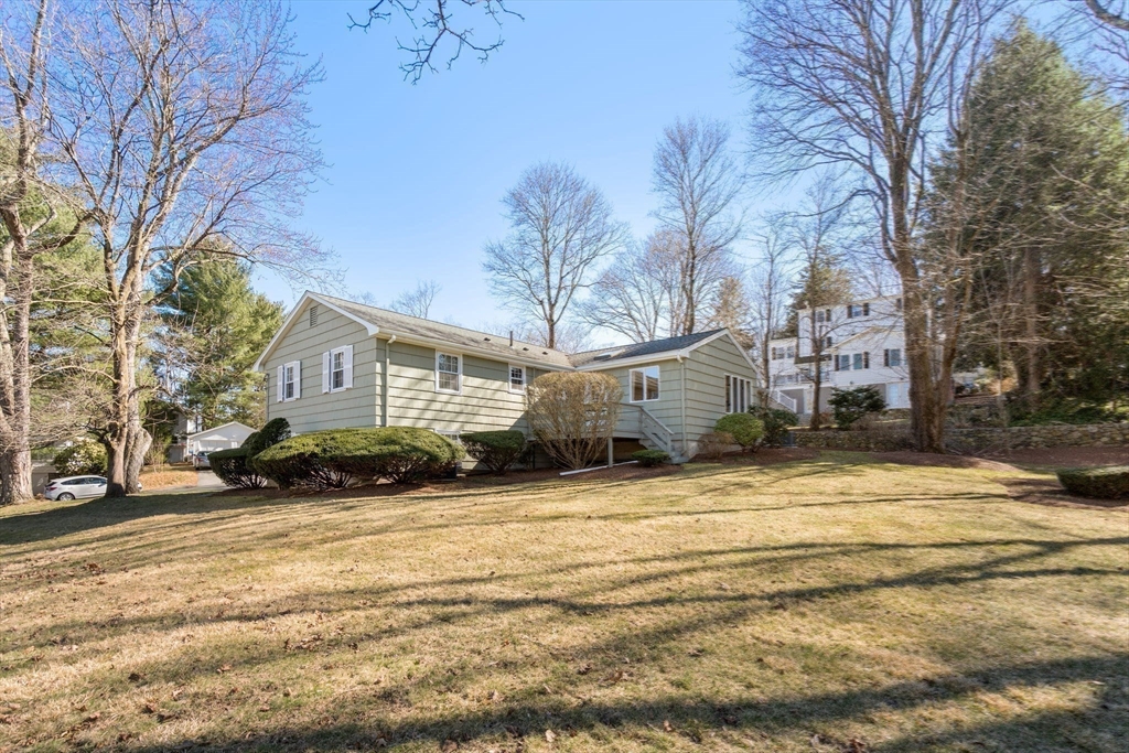 3 Tower Road Lexington, MA 02421 - Photo 36 of 38 a view of a house with snow on the side of the road