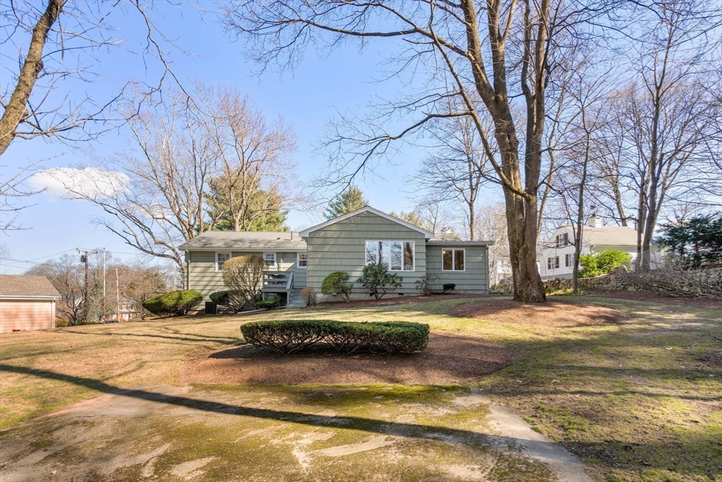 3 Tower Road Lexington, MA 02421 - Photo 5 of 38 a house with trees in the background
