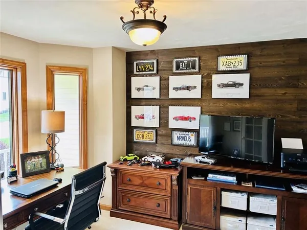 a kitchen with stainless steel appliances granite countertop a stove and cabinets