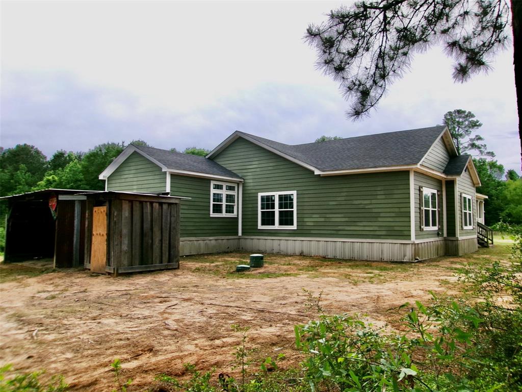 810 Williams Road Converse, LA 71419 - Photo 15 of 15 a view of a house with a yard