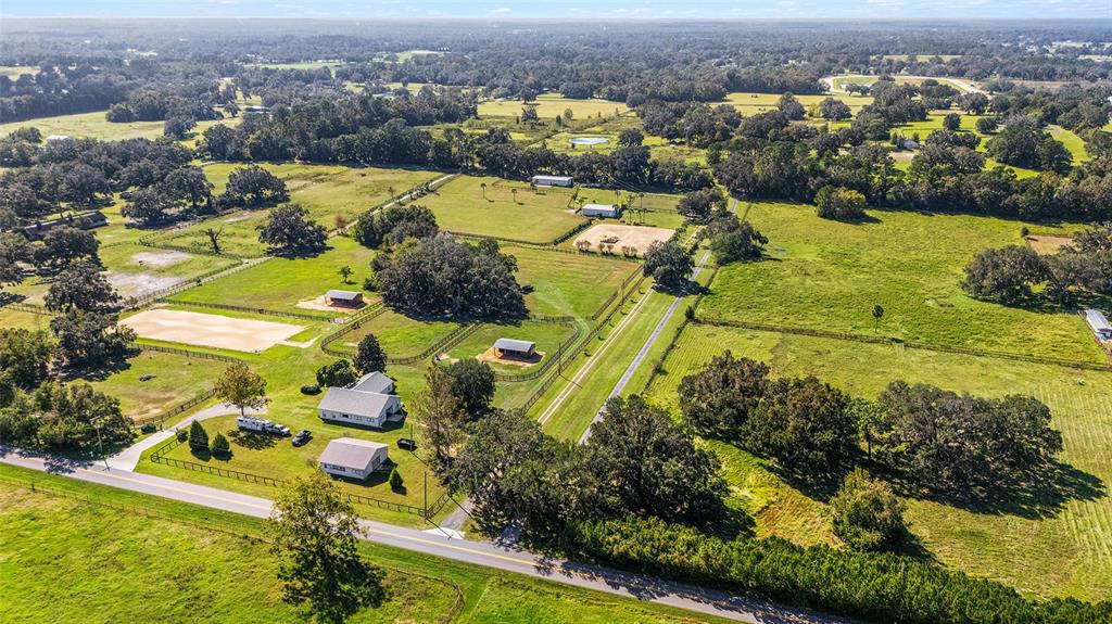 4520 Northwest 95th Avenue Road Ocala, FL 34482 - Photo 51 of 87 an aerial view of residential houses with outdoor space