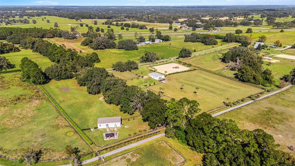 4520 Northwest 95th Avenue Road Ocala, FL 34482 - Photo 52 of 87 an aerial view of residential houses with outdoor space