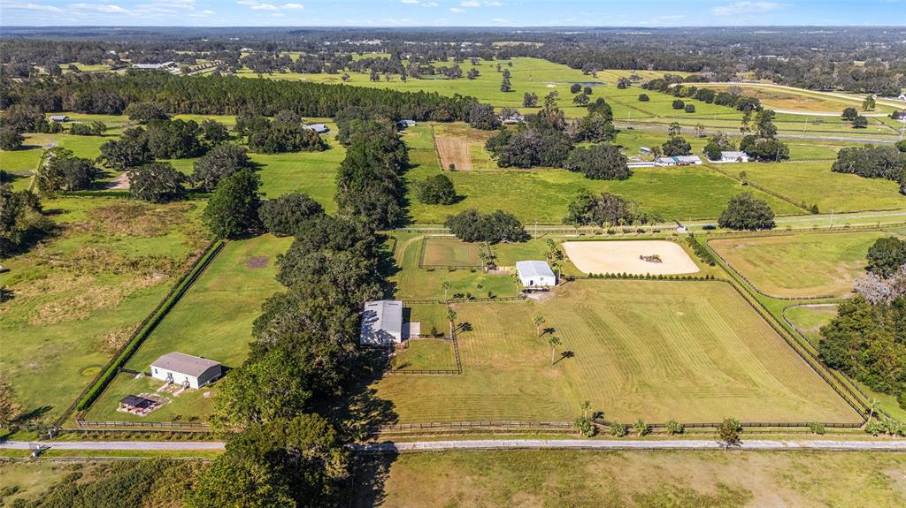 4520 Northwest 95th Avenue Road Ocala, FL 34482 - Photo 55 of 87 an aerial view of residential houses with outdoor space