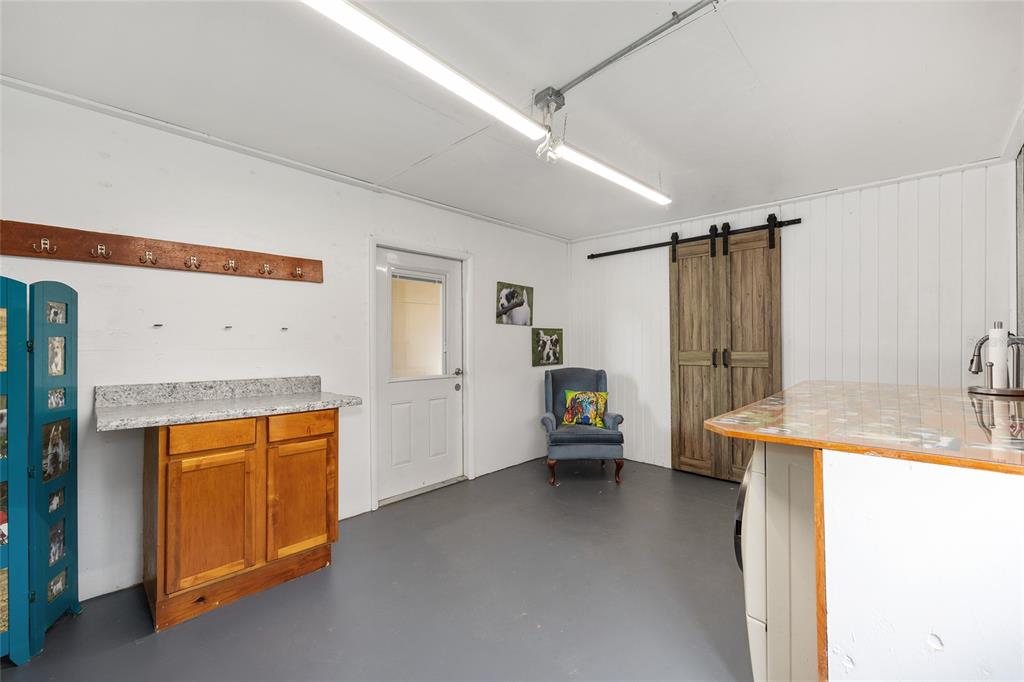 4520 Northwest 95th Avenue Road Ocala, FL 34482 - Photo 67 of 87 a view of a storage & utility room with a sink