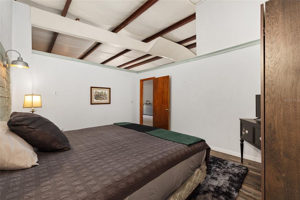 4520 Northwest 95th Avenue Road Ocala, FL 34482 - Photo 80 of 87 a bedroom with a bed next to a window