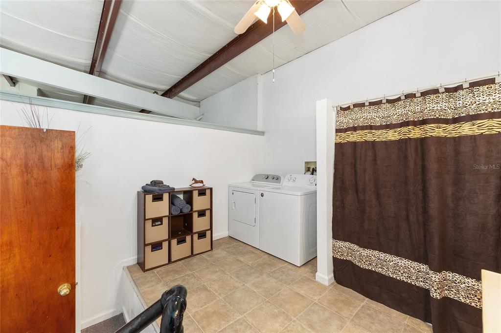 4520 Northwest 95th Avenue Road Ocala, FL 34482 - Photo 85 of 87 a view of a storage & utility room with two washing machine