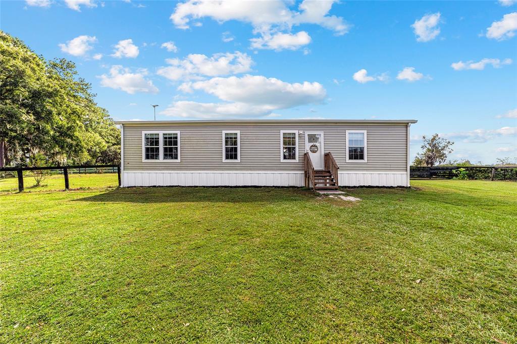 4520 Northwest 95th Avenue Road Ocala, FL 34482 - Photo 9 of 87 a house view with outdoor space