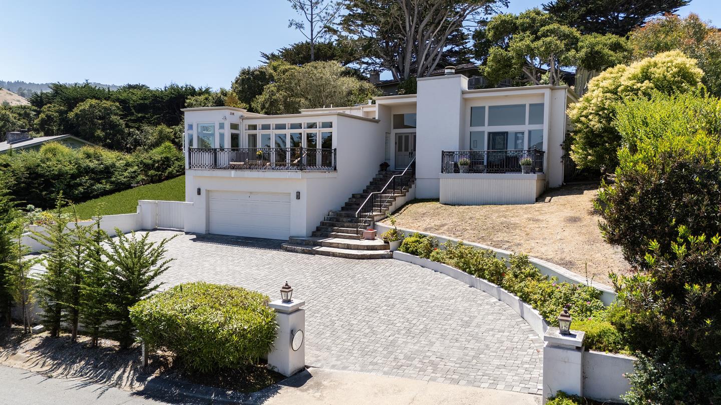 2920 Ribera Road Carmel, CA 93923 - Photo 1 of 18 front view of a house with a yard