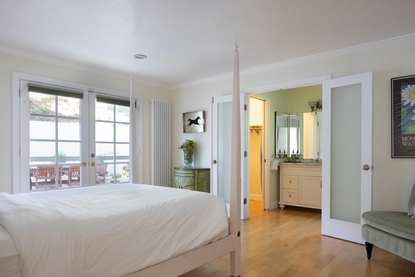 2920 Ribera Road Carmel, CA 93923 - Photo 13 of 18 a bedroom with a bed and a window