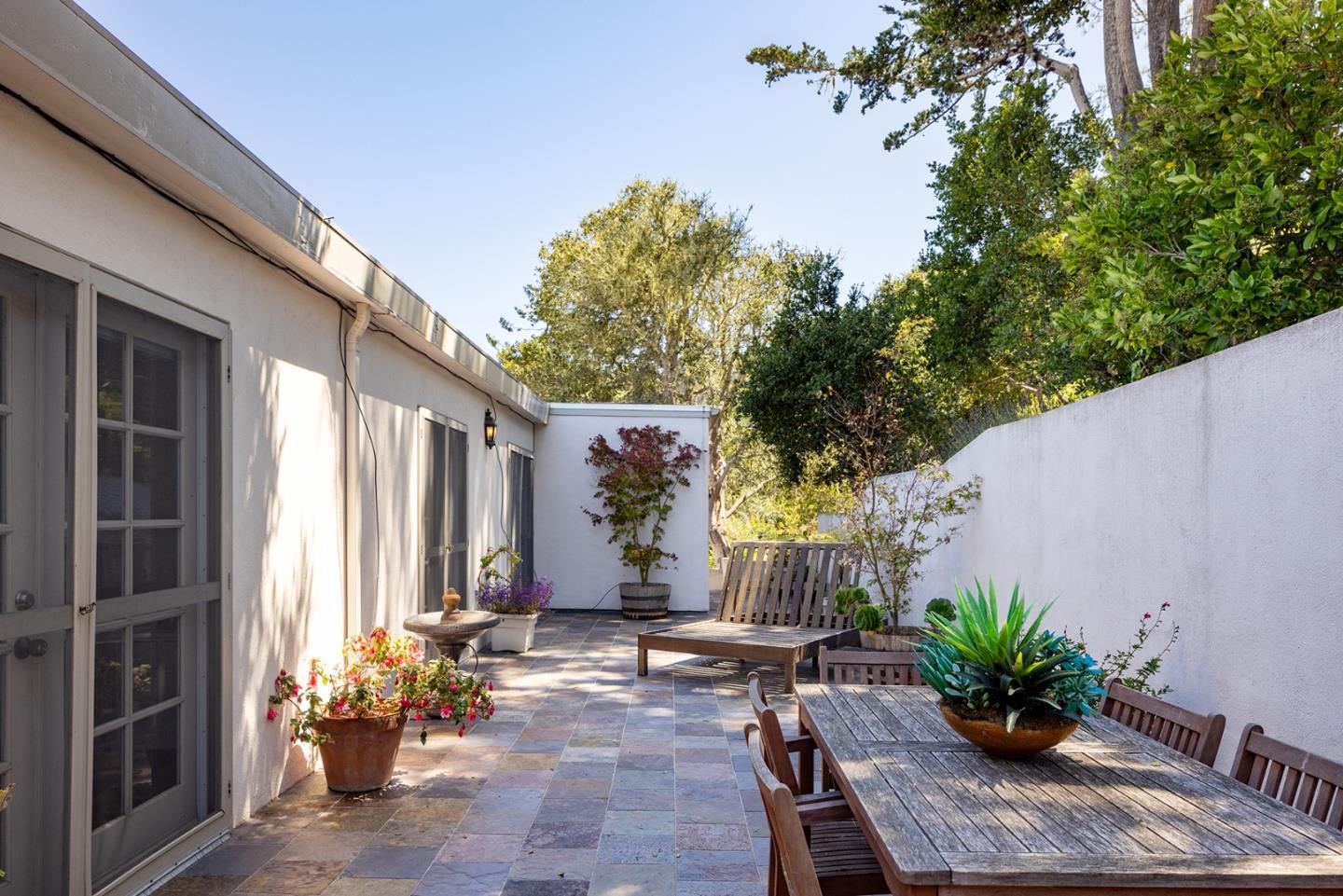2920 Ribera Road Carmel, CA 93923 - Photo 16 of 18 a view of a chairs and table in a patio