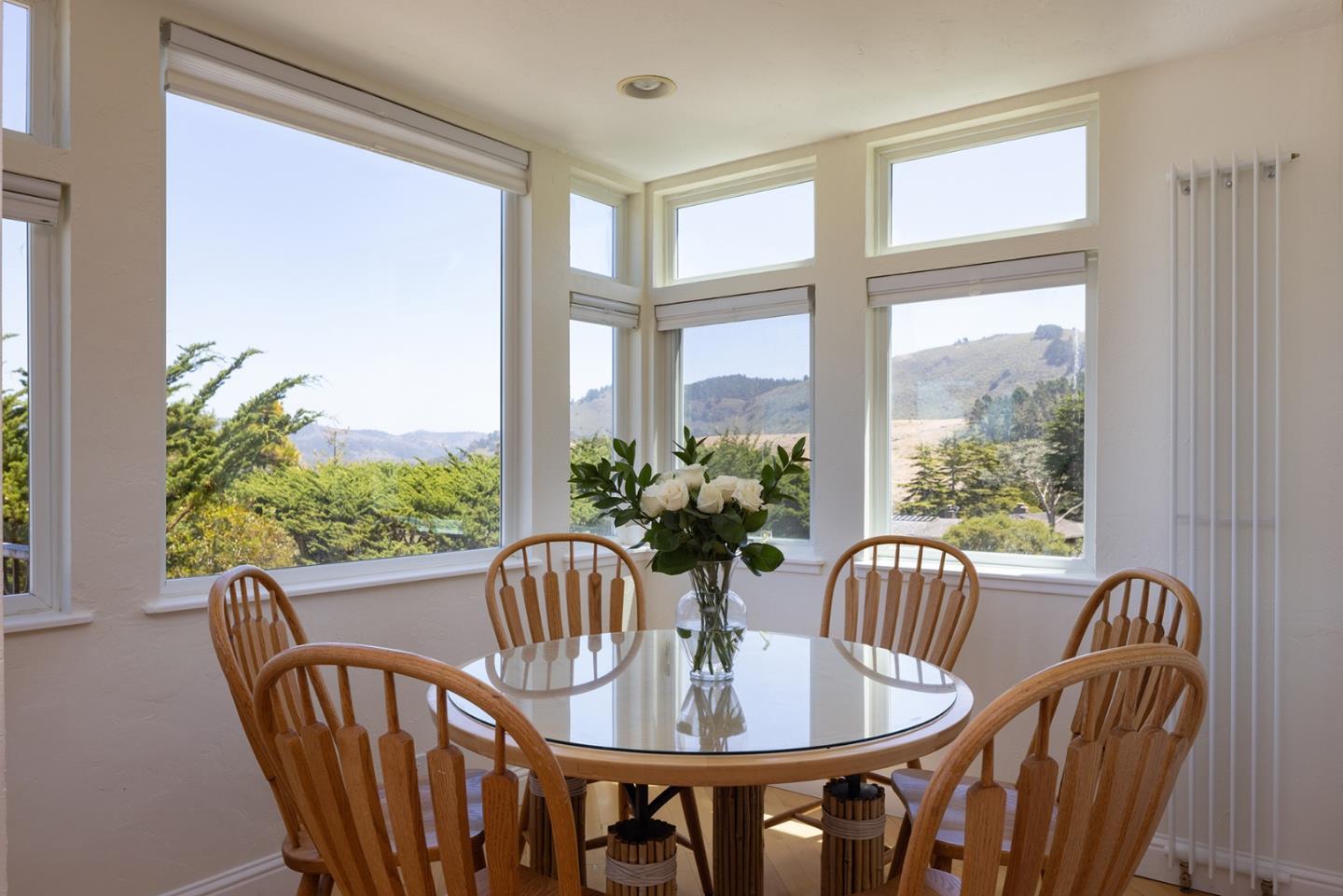 2920 Ribera Road Carmel, CA 93923 - Photo 7 of 18 a view of a dining room with furniture window and outside view